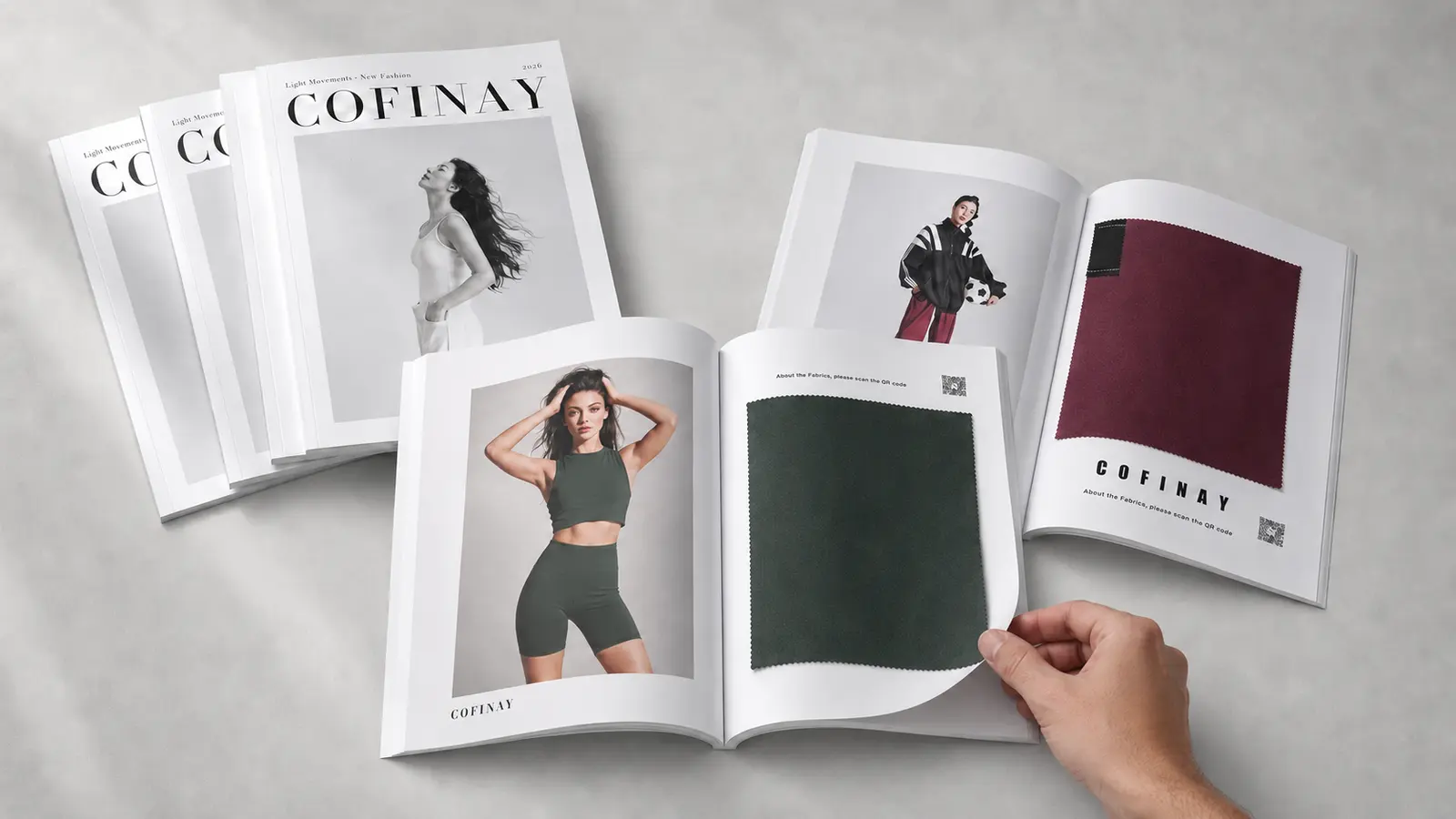 Cofinay's 20-look activewear magazine with physical fabric swatches and individual QR codes.