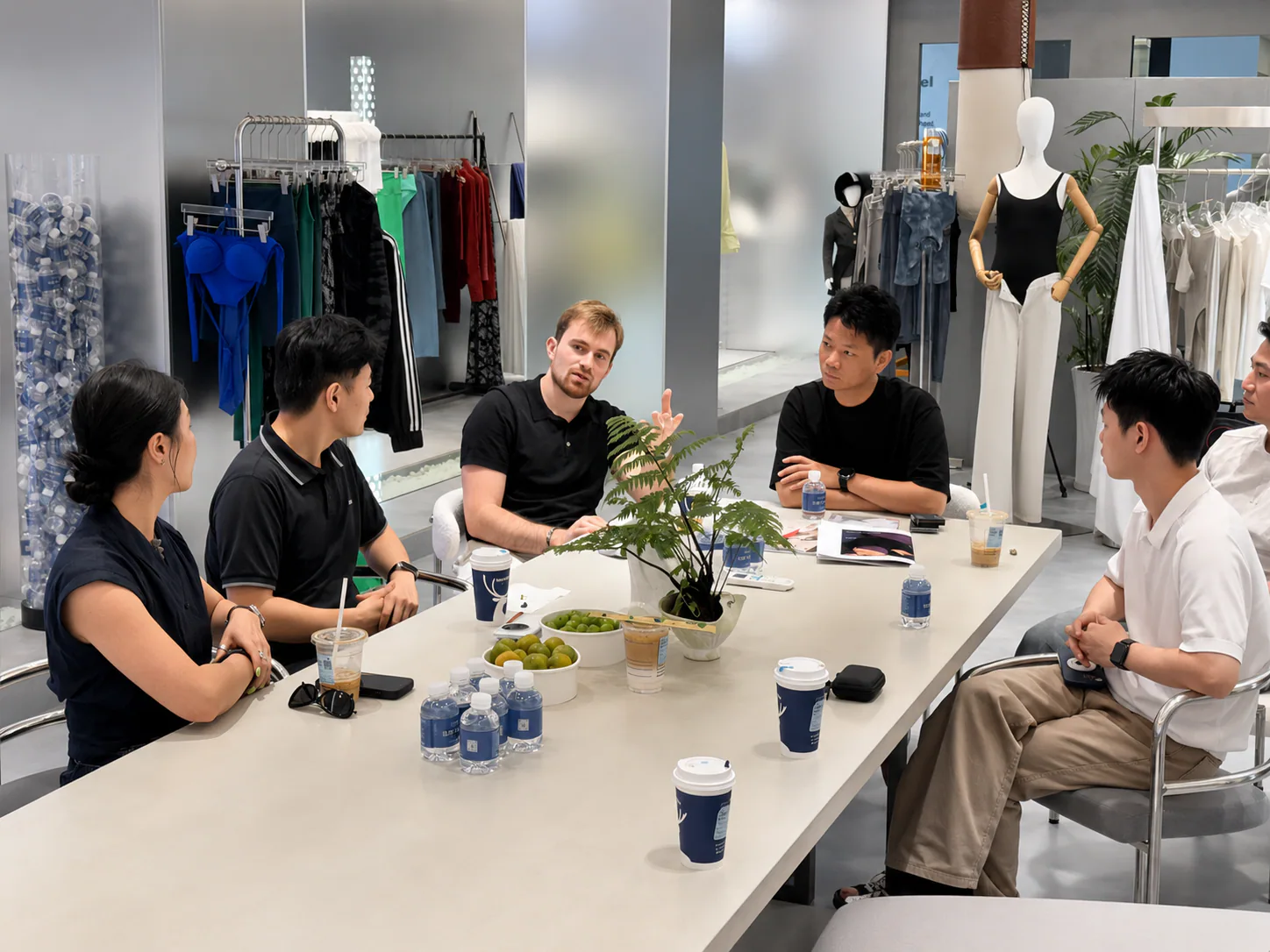 Mr. Zhuo inspecting looms in Dongguan factory
